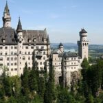 Neuschwanstein is a 19th century historicist (neoromanesque) castle built by Ludwig II of Bavaria, inspired by the romanticism of the time., tags: und die der - CC BY-SA